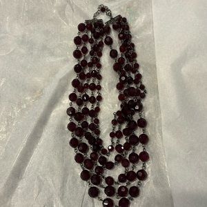 Gorgeous cranberry red multi strand necklace.Faceted glass bead choker .